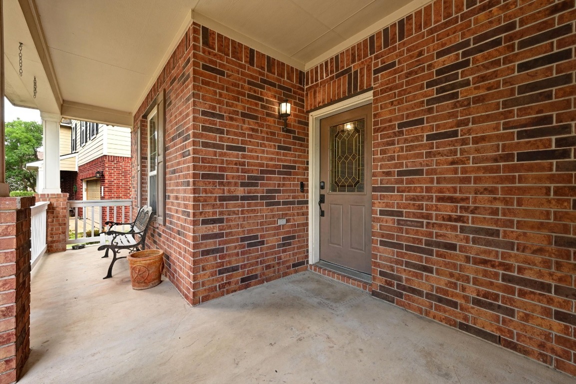 964 Hometown Parkway Kyle, TX 78640 - Photo 4 of 38 a view of a brick building with many windows