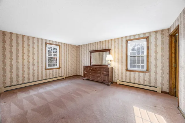 an empty room with windows