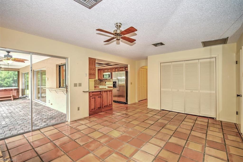 5960 Copper Leaf Lane Naples, FL 34116 - Photo 12 of 37 a view of a livingroom with a furniture