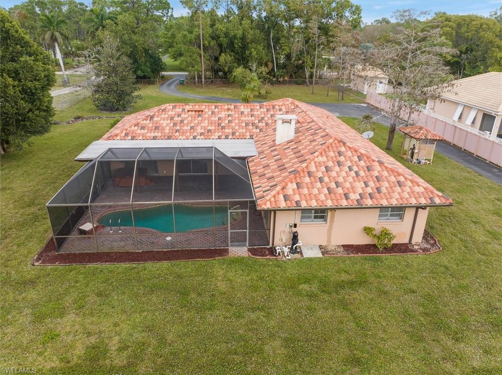 5960 Copper Leaf Lane Naples, FL 34116 - Photo 25 of 37 an aerial view of a house