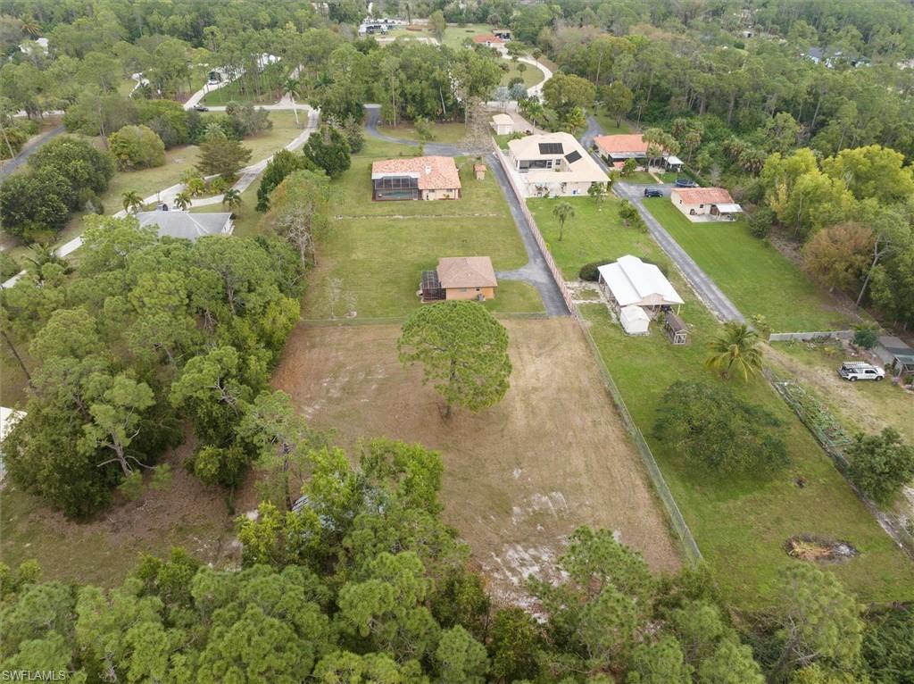 5960 Copper Leaf Lane Naples, FL 34116 - Photo 32 of 37 an aerial view of a residential houses with outdoor space and street view