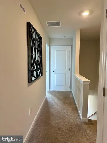 a view of a hallway with entryway