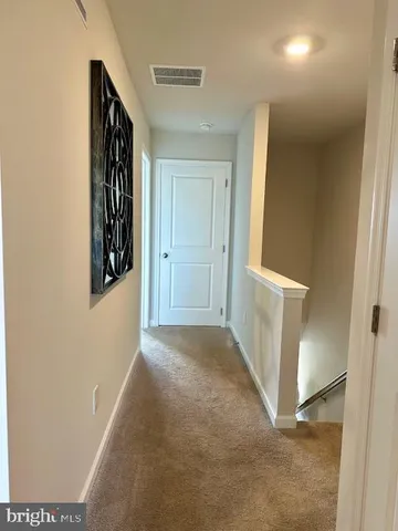 a view of hallway with front door