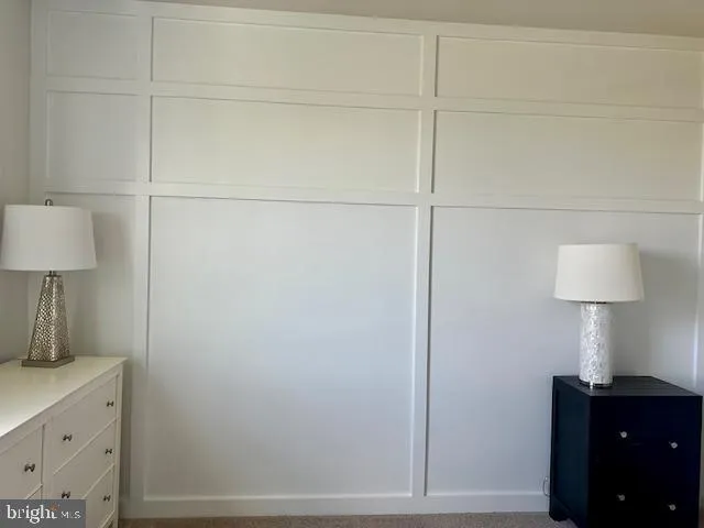 a room with a bed and a table