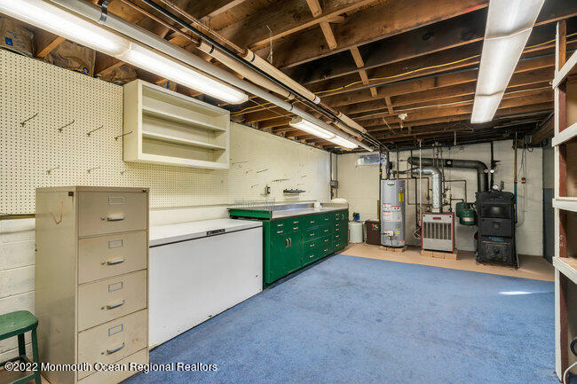 11 Charleston Spring Road Millstone Township, NJ 08510 - Photo 35 of 49 Basement w/ Workbench