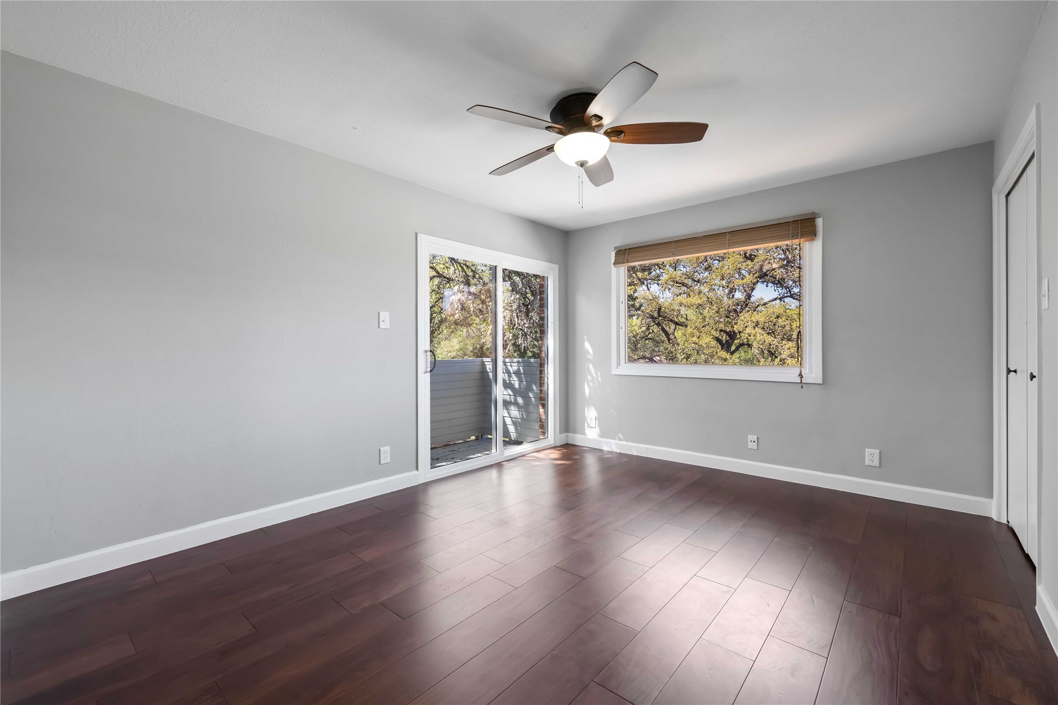 1703 Waterloo Trail, Unit B Austin, TX 78704 - Photo 16 of 36 Spare room featuring a ceiling fan and dark wood-style floors