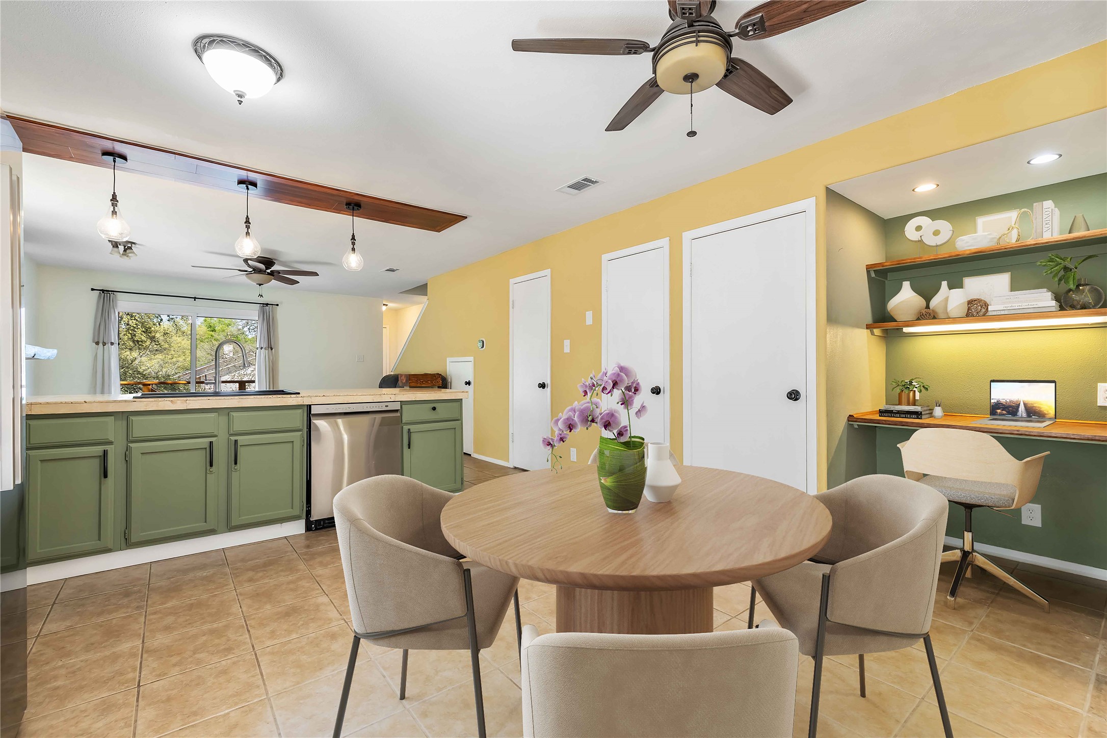 1703 Waterloo Trail, Unit B Austin, TX 78704 - Photo 5 of 36 Dining area with ceiling fan and light tile patterned flooring