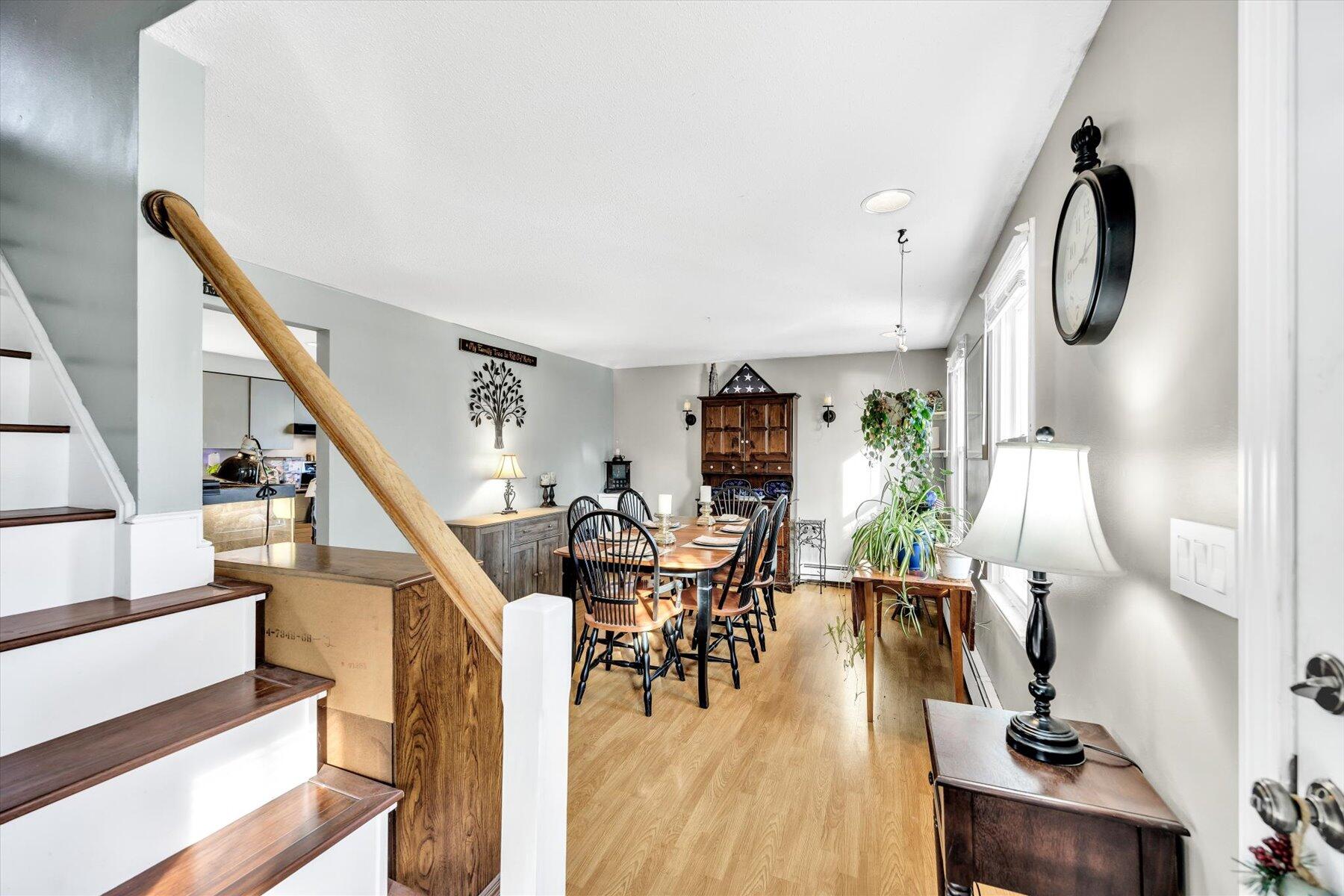39 Papnomett Road Mashpee, MA 02649 - Photo 3 of 34 a living room with furniture and a wooden floor