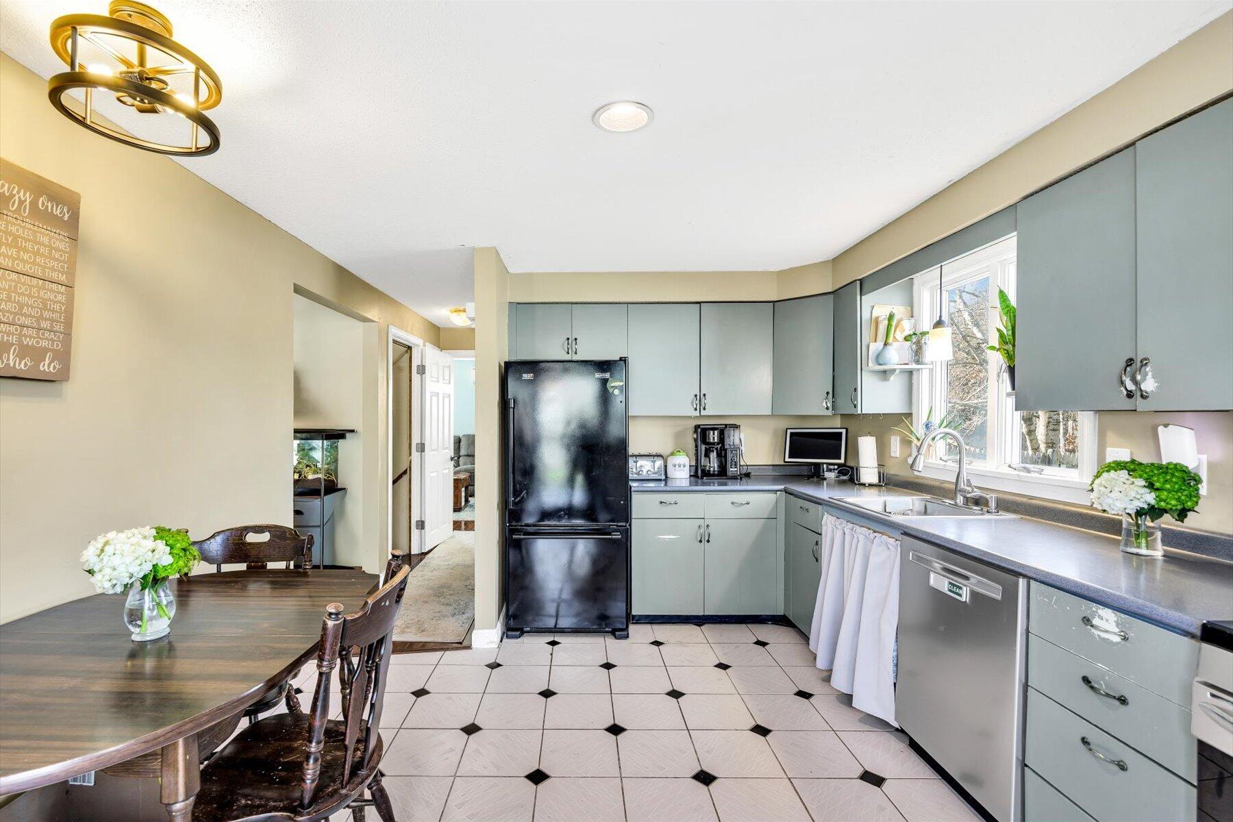 39 Papnomett Road Mashpee, MA 02649 - Photo 6 of 34 a kitchen with stainless steel appliances a refrigerator sink and stove