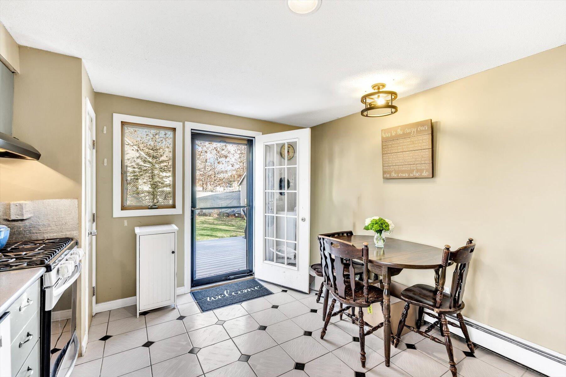 39 Papnomett Road Mashpee, MA 02649 - Photo 8 of 34 a view of a dining room with furniture and a window