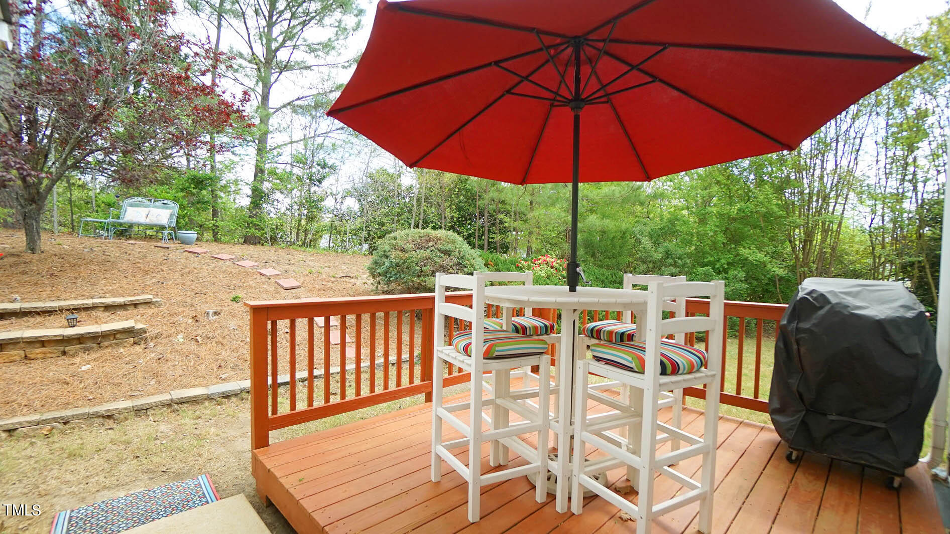 3318 Colorcott Street Raleigh, NC 27614 - Photo 11 of 28 a view of balcony with outdoor seating and wooden floor