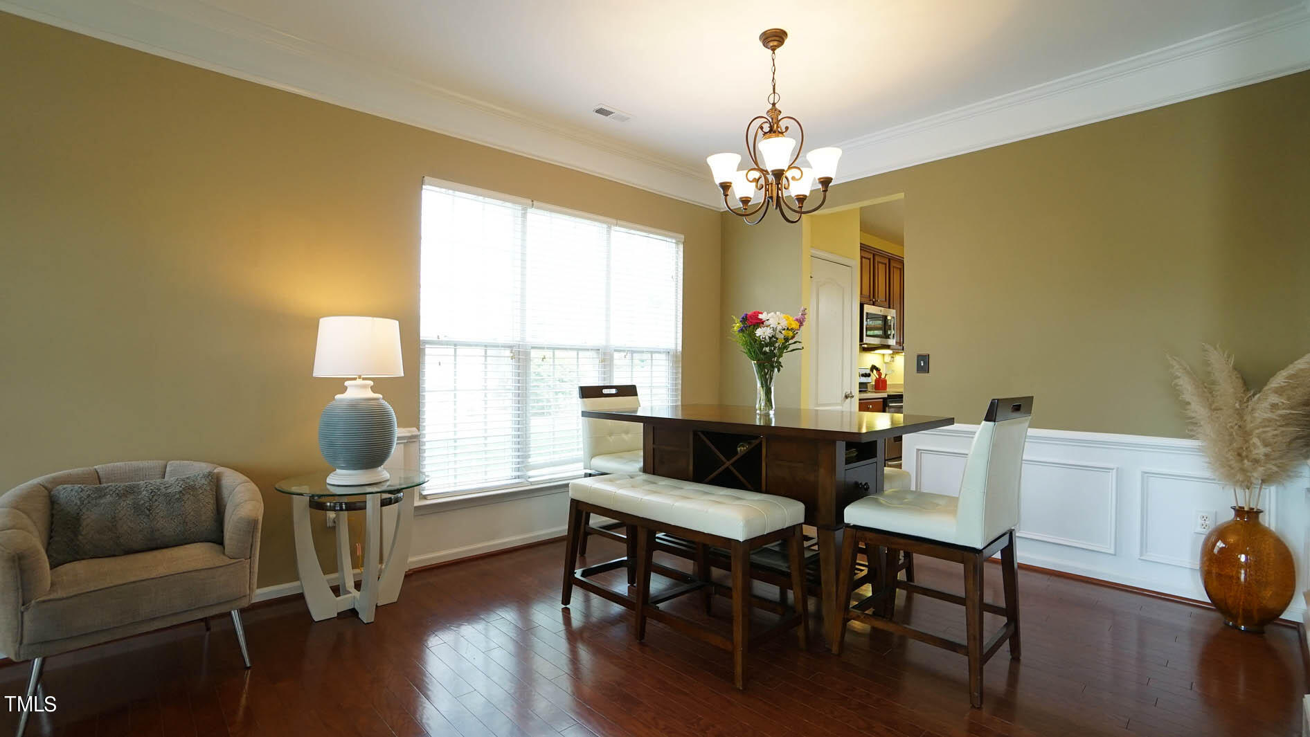 3318 Colorcott Street Raleigh, NC 27614 - Photo 14 of 28 a view of a dining room with furniture and wooden floor