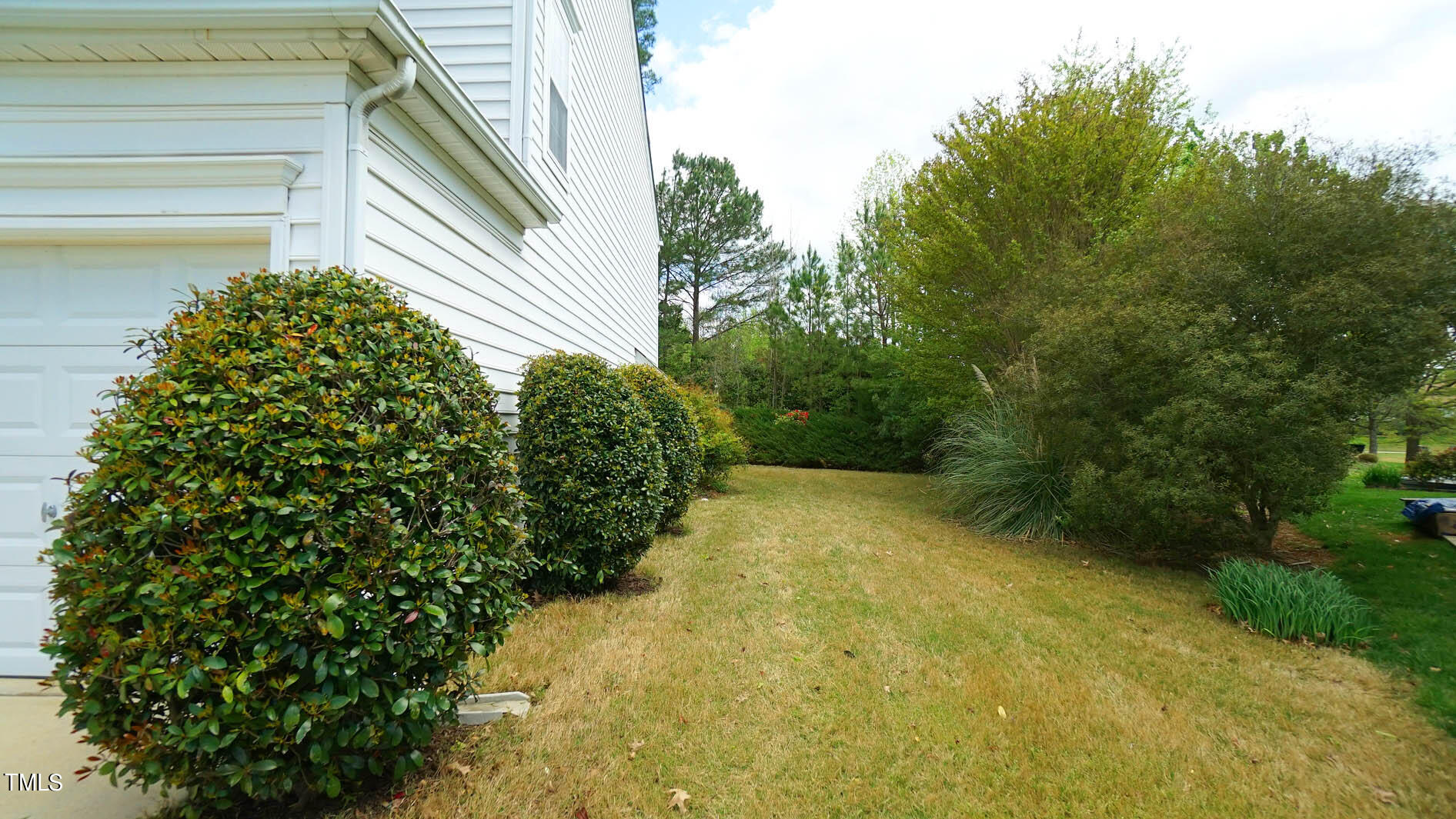 3318 Colorcott Street Raleigh, NC 27614 - Photo 5 of 28 a view of a back yard of the house