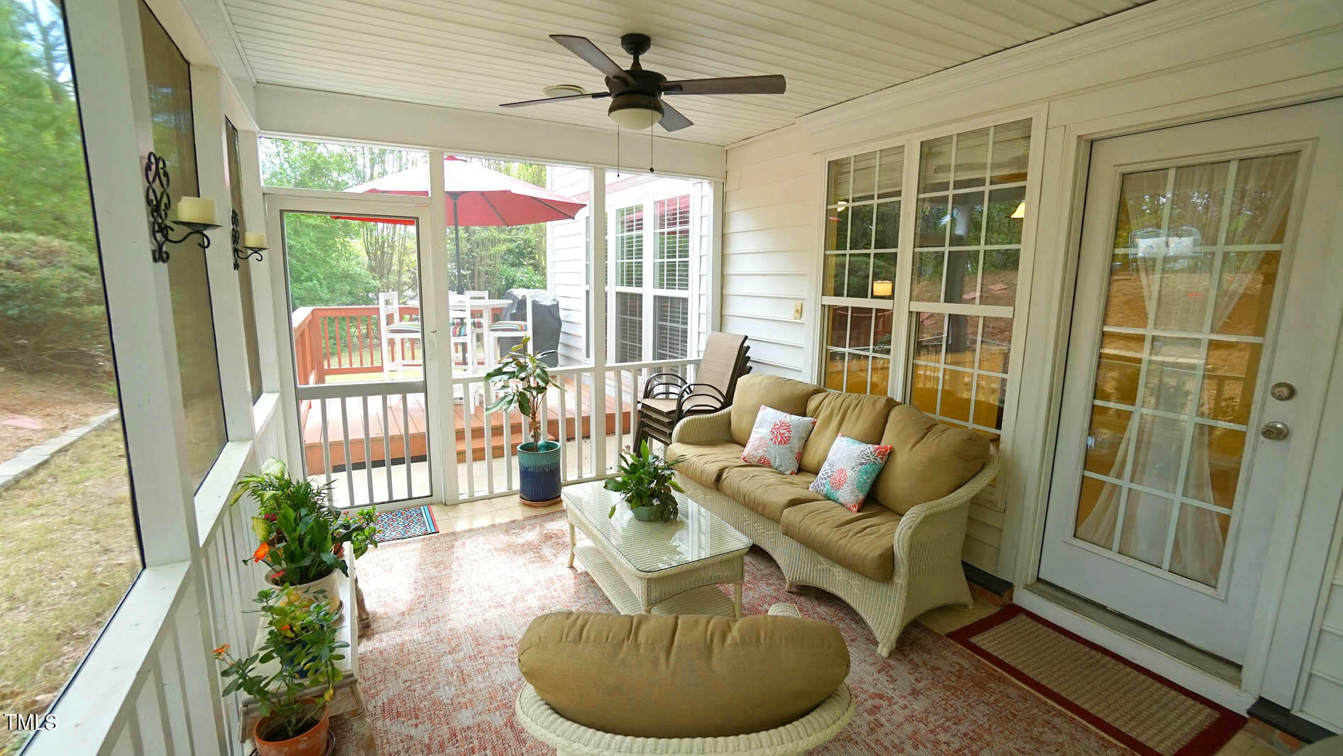 3318 Colorcott Street Raleigh, NC 27614 - Photo 9 of 28 a living room with furniture and a floor to ceiling window