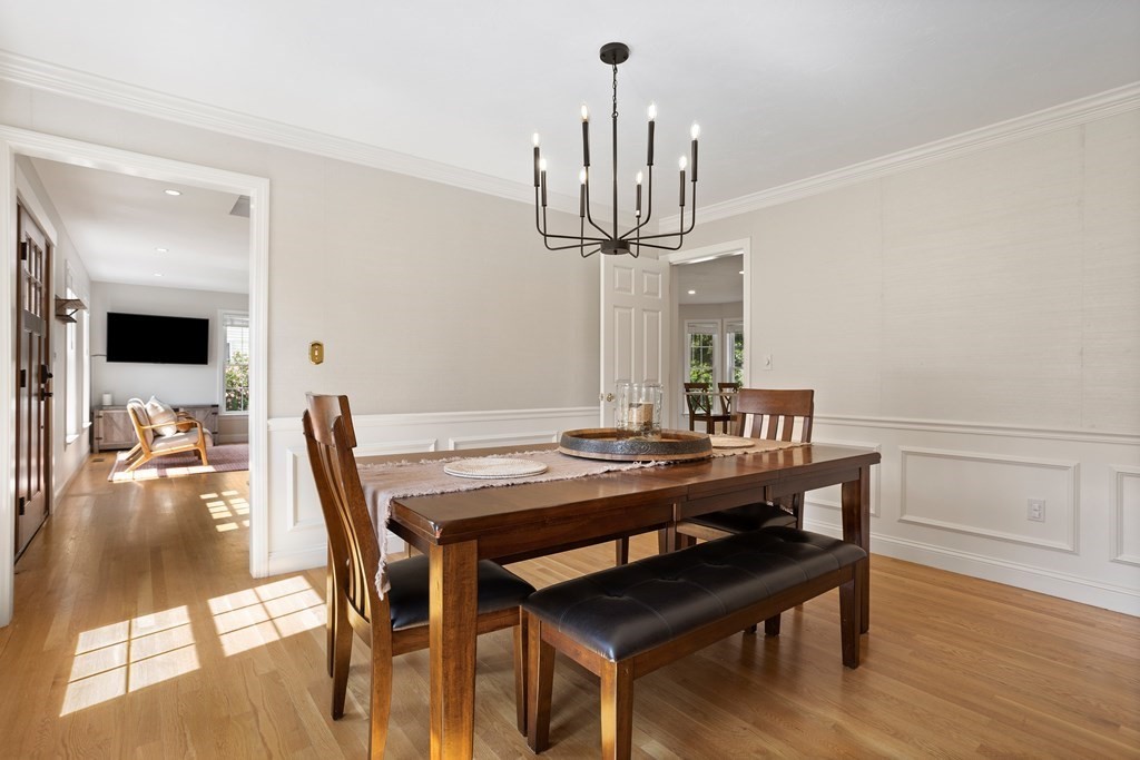 1 Sarah Lane Maynard, MA 01754 - Photo 11 of 40 a view of a dining room with furniture and wooden floor