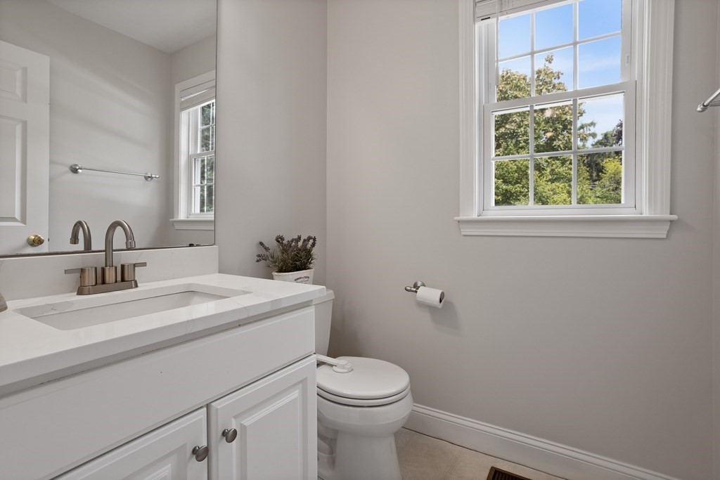 1 Sarah Lane Maynard, MA 01754 - Photo 13 of 40 a bathroom with a sink toilet and a mirror