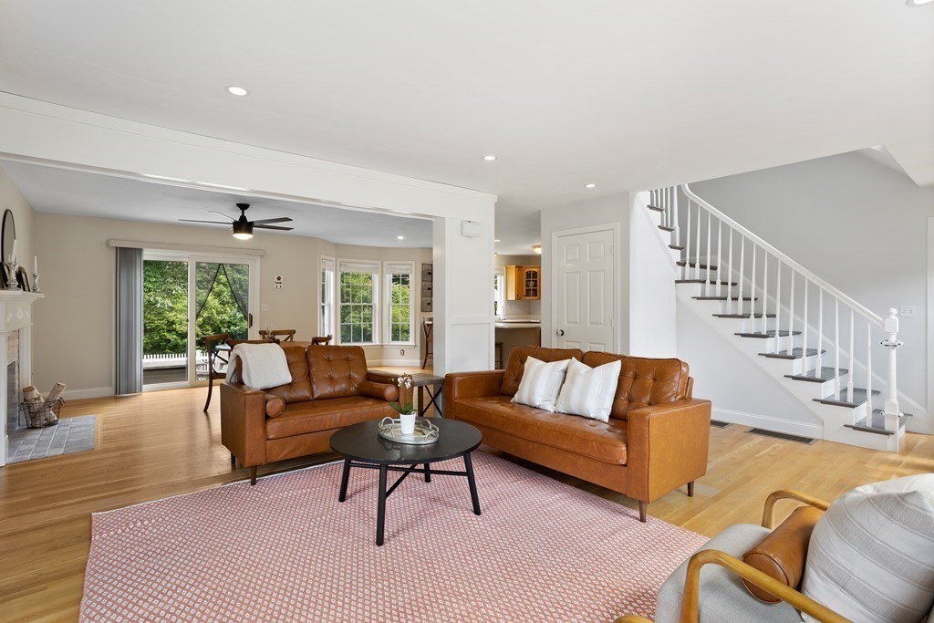 1 Sarah Lane Maynard, MA 01754 - Photo 15 of 40 a living room with furniture and a dining table