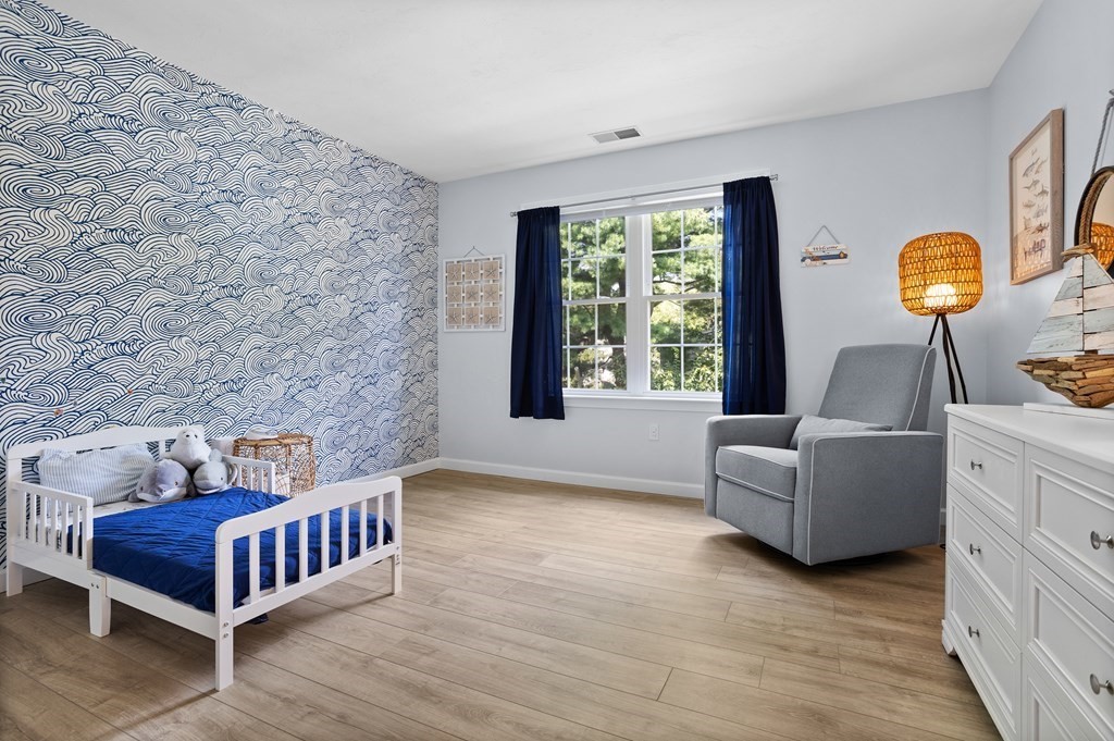 1 Sarah Lane Maynard, MA 01754 - Photo 22 of 40 a bedroom with furniture and a window