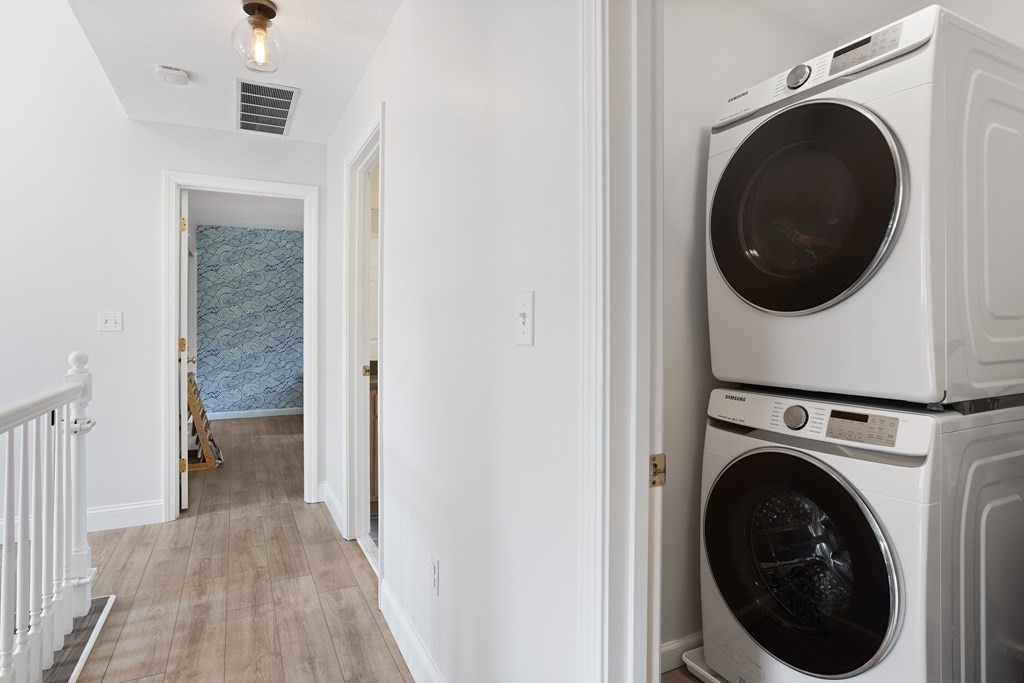 1 Sarah Lane Maynard, MA 01754 - Photo 24 of 40 a view of a hallway with washer and dryer