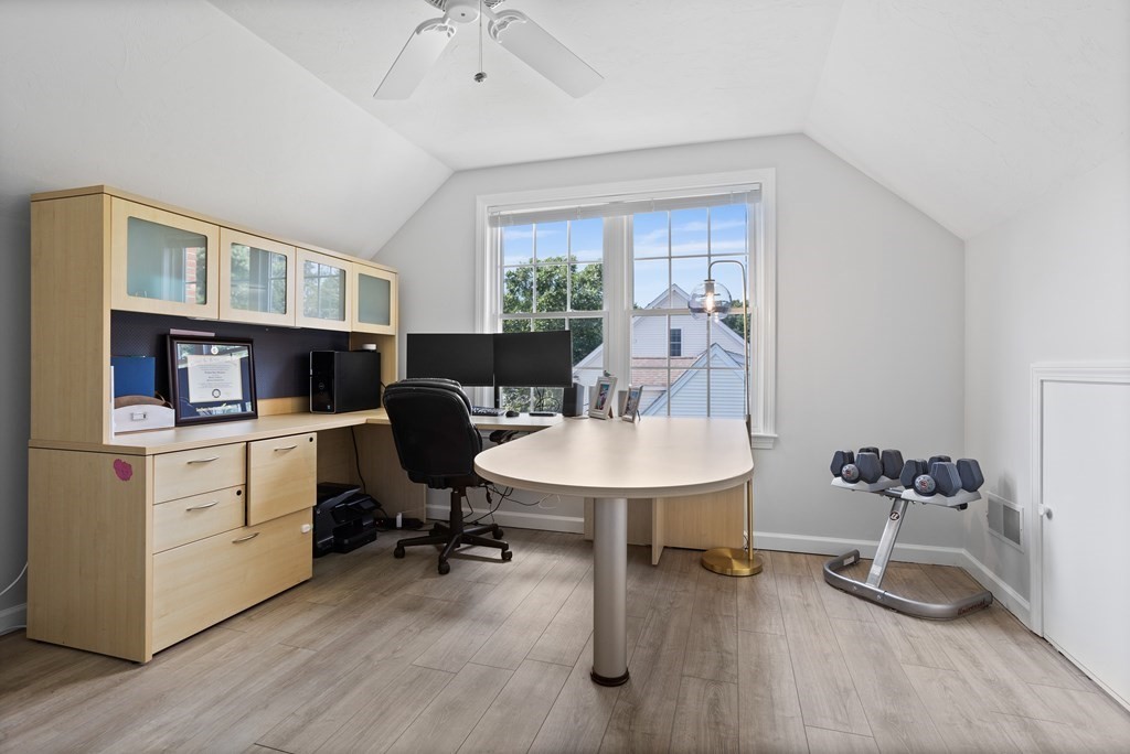 1 Sarah Lane Maynard, MA 01754 - Photo 30 of 40 a view of a workspace with furniture and a potted plant