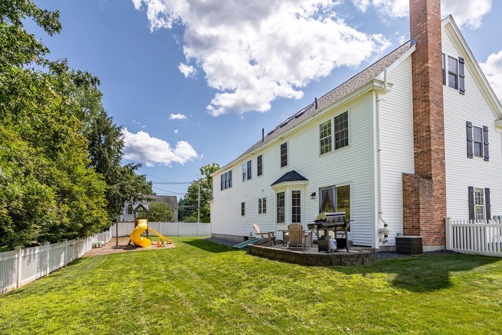1 Sarah Lane Maynard, MA 01754 - Photo 33 of 40 a view of a house with swimming pool and a yard