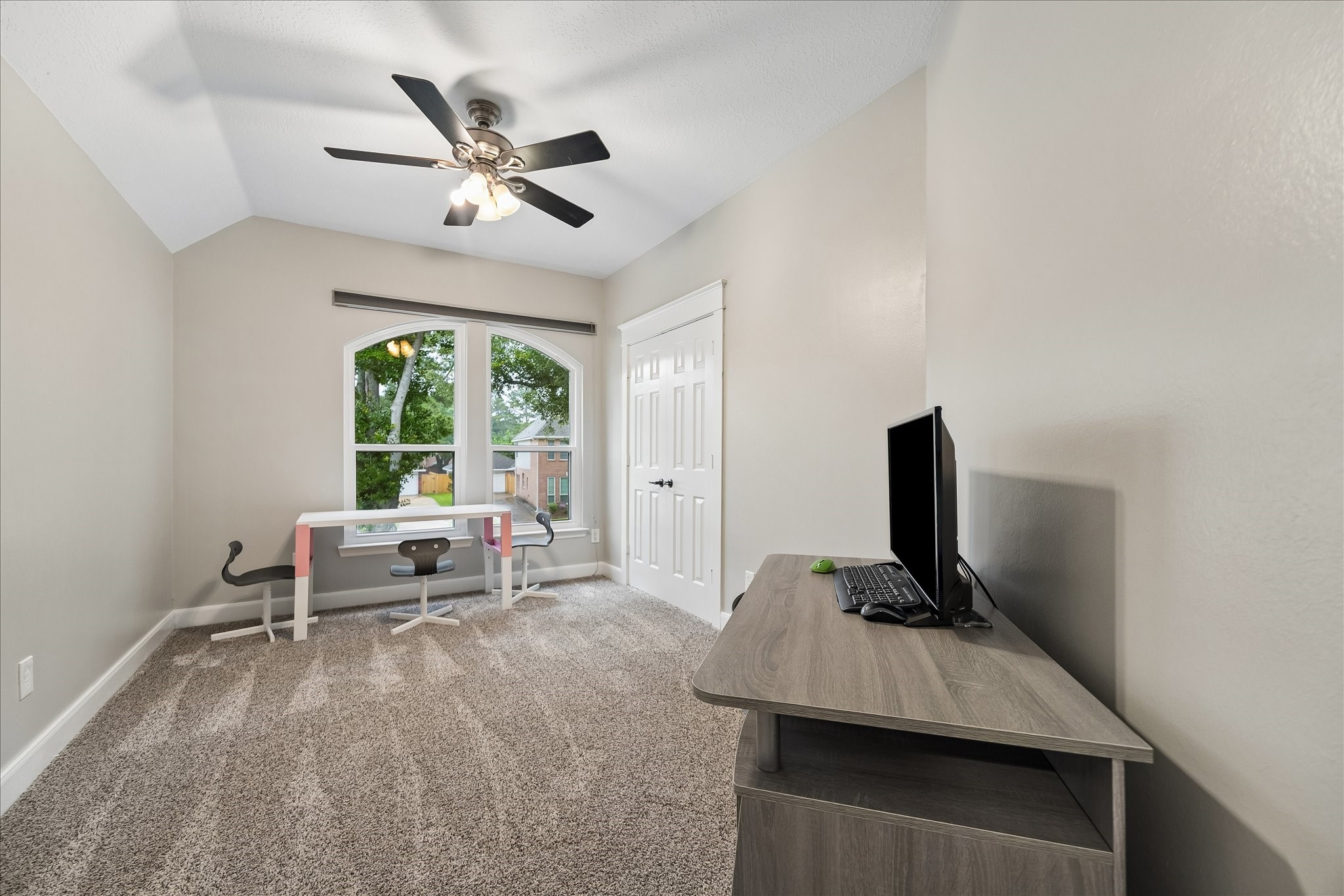 23039 Enchanted Landing Lane Katy, TX 77494 - Photo 23 of 30 a work room with furniture and a large window
