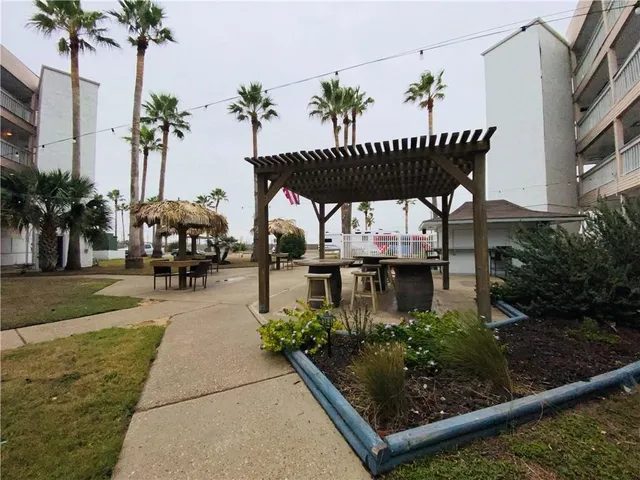 a view of a terrace with sitting area