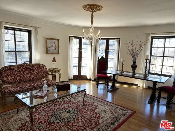 a living room with furniture or window and a table