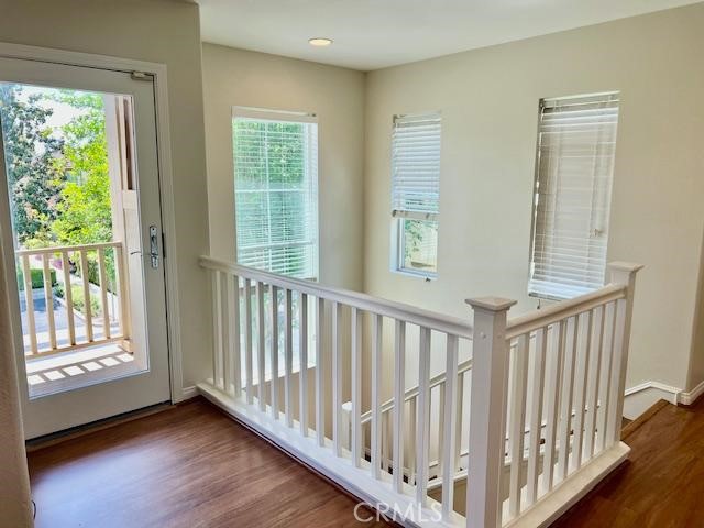 14566 Rochester Avenue Chino, CA 91710 - Photo 13 of 33 a view of an entryway with wooden floor and windows