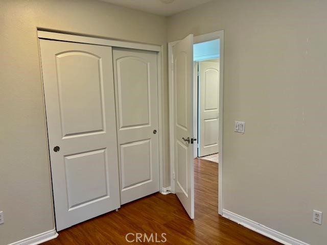 14566 Rochester Avenue Chino, CA 91710 - Photo 17 of 33 a view of an empty room with wooden floor