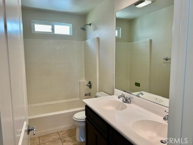 14566 Rochester Avenue Chino, CA 91710 - Photo 19 of 33 a bathroom with a sink a toilet and shower