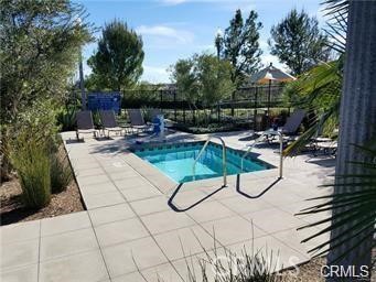 14566 Rochester Avenue Chino, CA 91710 - Photo 32 of 33 a view of a backyard with sitting area