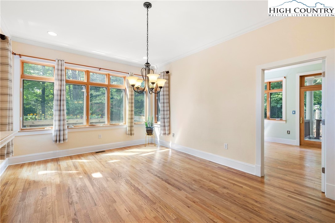 461 Summit Rise Drive Boone, NC 28607 - Photo 13 of 50 a view of empty room with wooden floor and fan