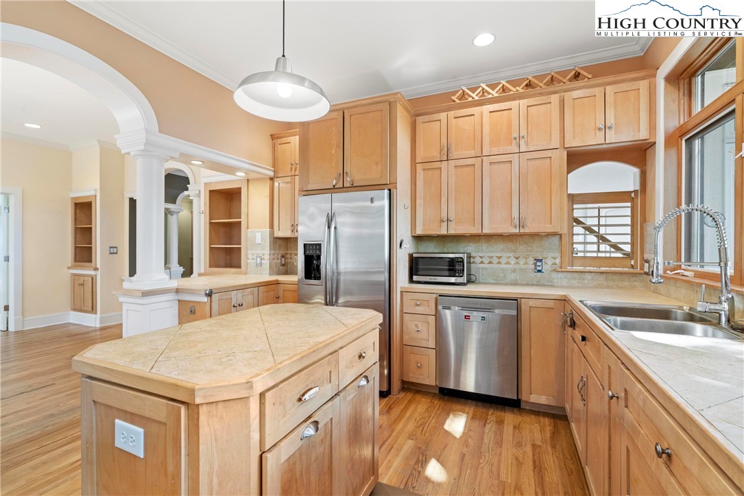 461 Summit Rise Drive Boone, NC 28607 - Photo 16 of 50 a kitchen with a stove a sink and a refrigerator