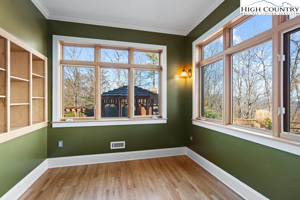 461 Summit Rise Drive Boone, NC 28607 - Photo 23 of 50 a view of an empty room with a window and wooden floor
