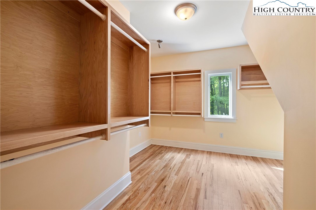 461 Summit Rise Drive Boone, NC 28607 - Photo 30 of 50 wooden floor in an empty room with a window