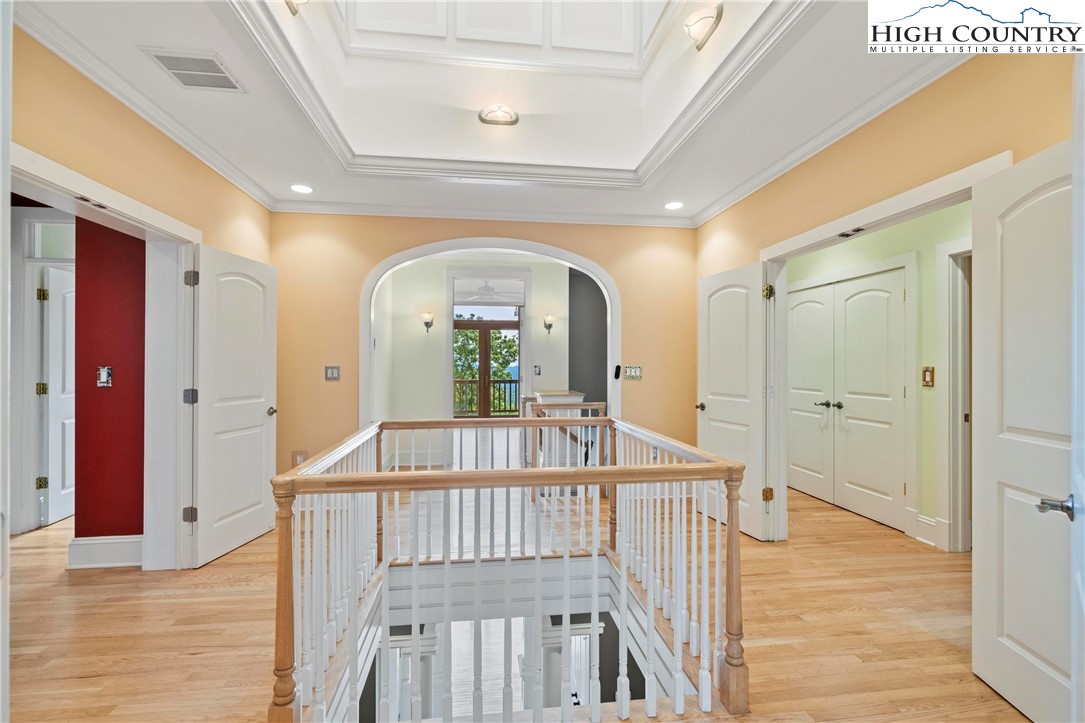 461 Summit Rise Drive Boone, NC 28607 - Photo 31 of 50 a view of hall way with wooden floor and staircase