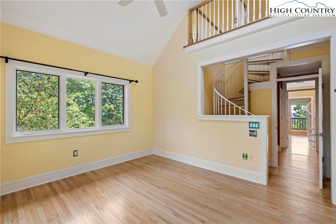 461 Summit Rise Drive Boone, NC 28607 - Photo 33 of 50 an empty room with wooden floor and windows