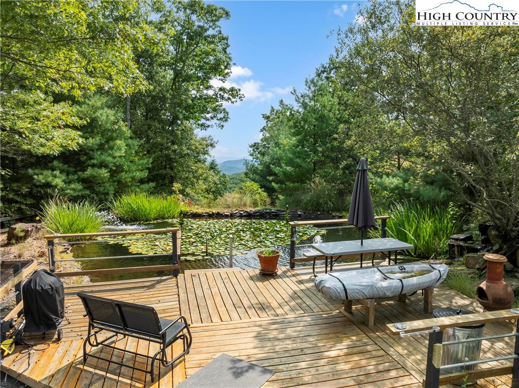 461 Summit Rise Drive Boone, NC 28607 - Photo 45 of 50 a view of a patio with couches chairs and a table and chairs