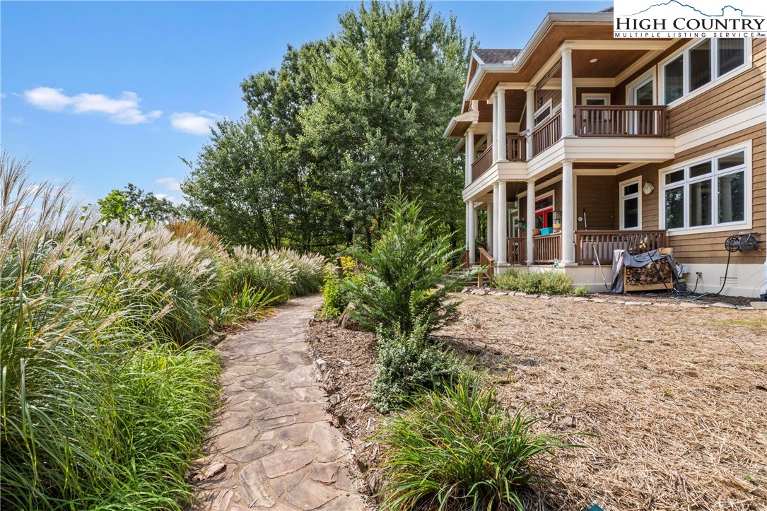 461 Summit Rise Drive Boone, NC 28607 - Photo 6 of 50 a pathway of a house with a yard