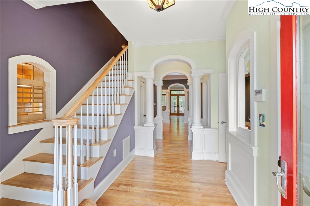 461 Summit Rise Drive Boone, NC 28607 - Photo 8 of 50 a view of front door with wooden floor and stairs