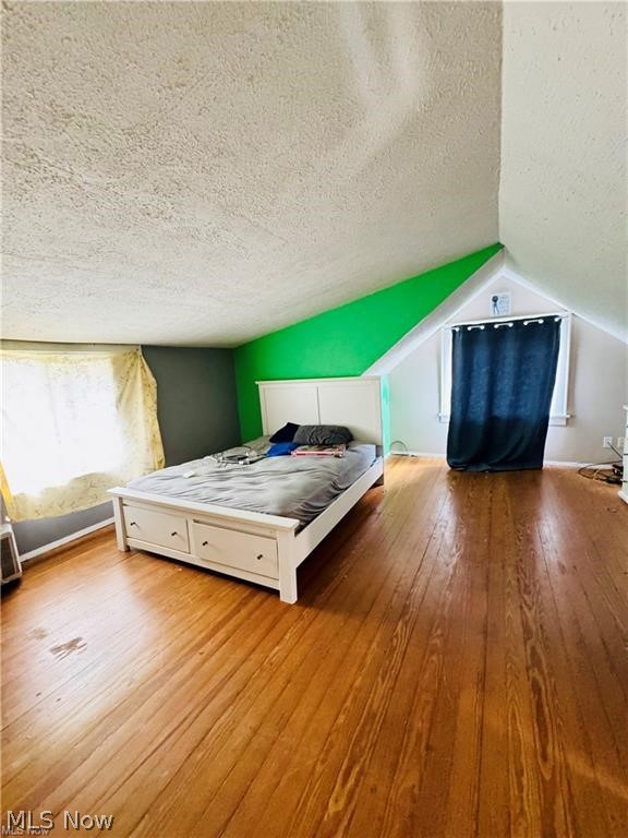 927 Avon Street Akron, OH 44310 - Photo 7 of 12 Hardwood flooring throughout featuring natural wood grain