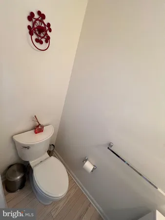 a bathroom with a toilet and a sink
