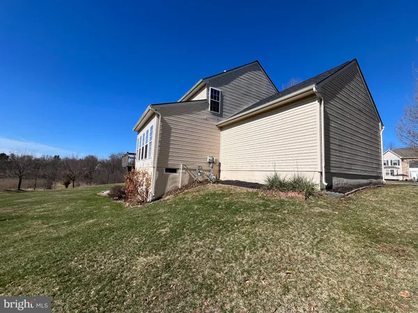 a house view with a backyard space