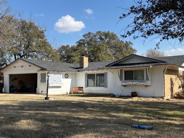 615 Old Comanche Road Early, TX 76802 - Photo 1 of 1 a front view of a house with a yard