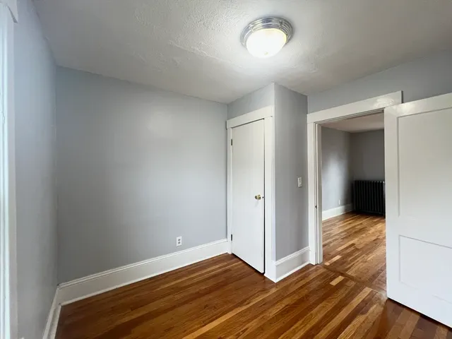 a bathroom with a sink toilet vanity and tub