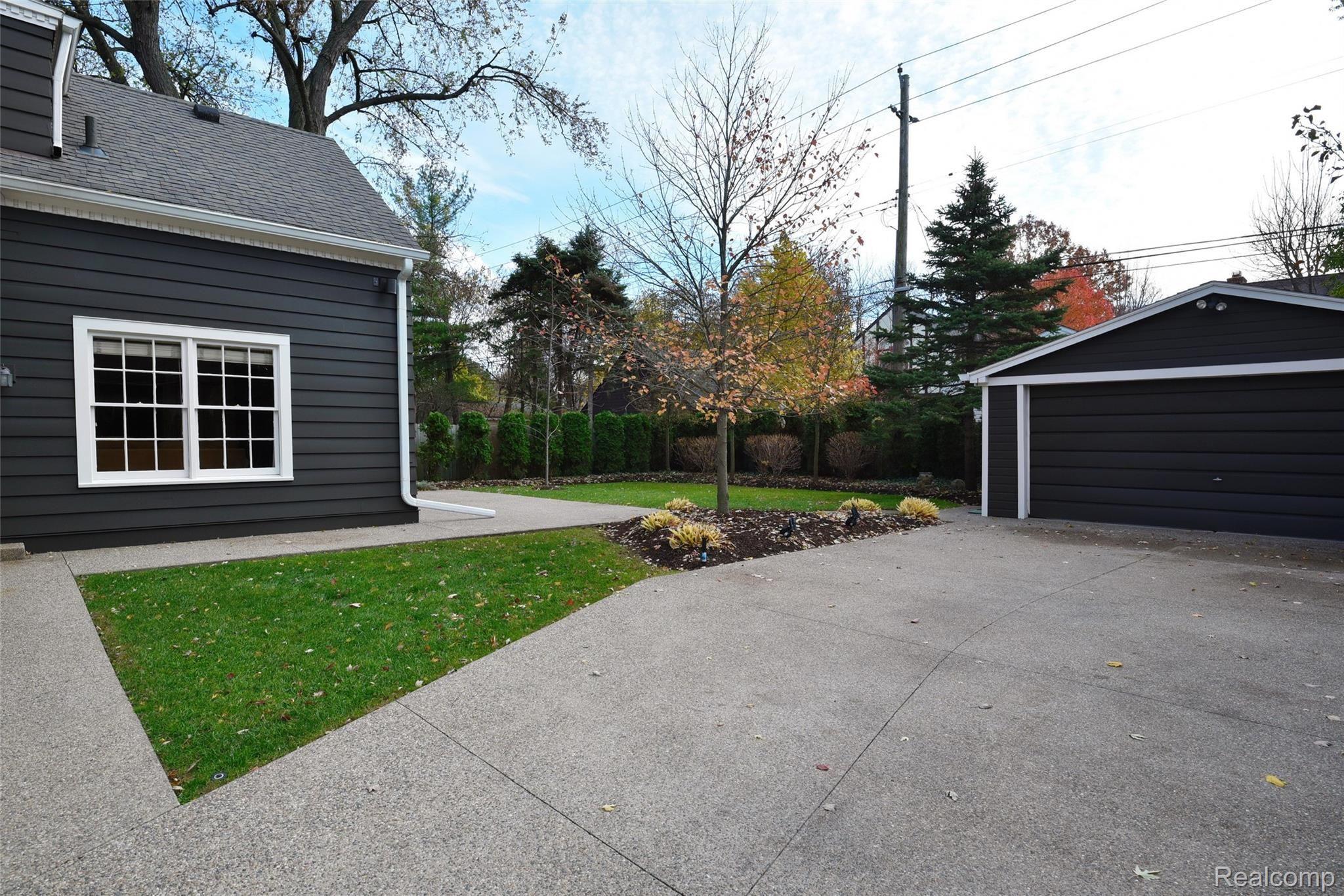 840 Rivenoak Street Birmingham, MI 48009 - Photo 34 of 34 Aggregate Driveway ~ View of 2-Car Heated Garage