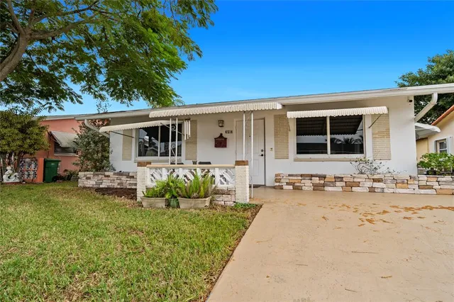 front view of a house with a patio