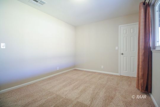 237 South American Street Ridgecrest, CA 93555 - Photo 15 of 26 an empty room with an entryway