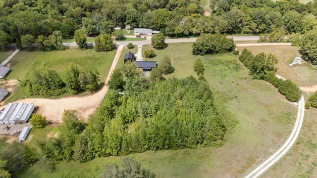 a view of a lake with a yard